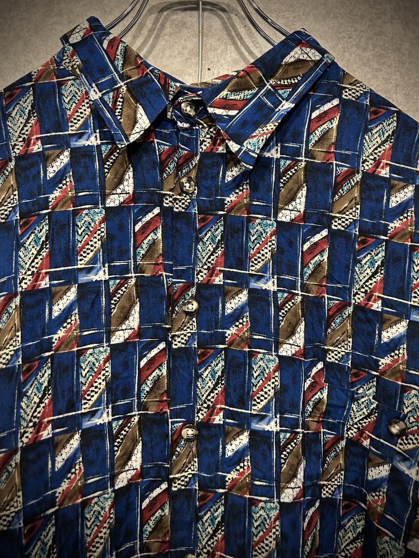 blue geometric pattern shirt